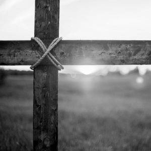 Cross against sunset